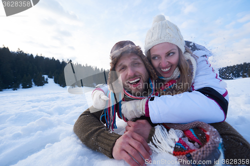 Image of romantic young couple on winter vacation