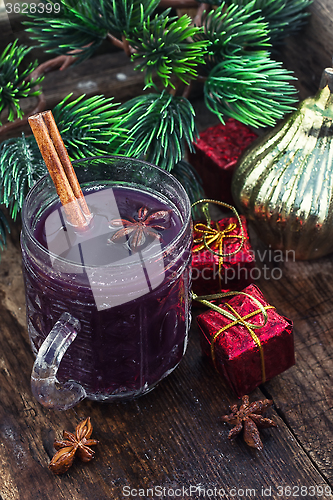 Image of Mulled wine and Christmas tree.