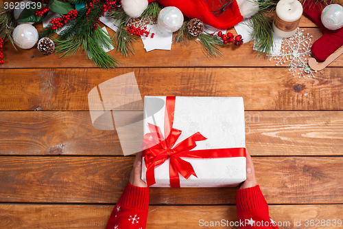 Image of The wooden table with Christmas decorations 