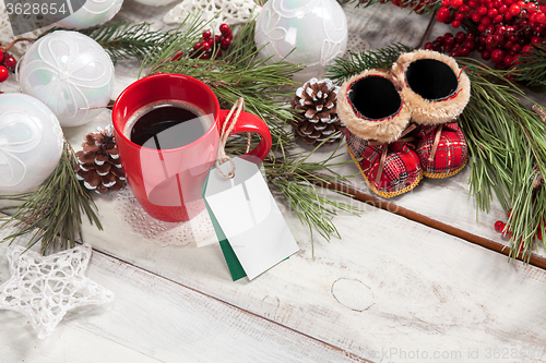 Image of The a cup of coffee on the wooden table 