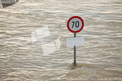 Image of Flooded street with sign