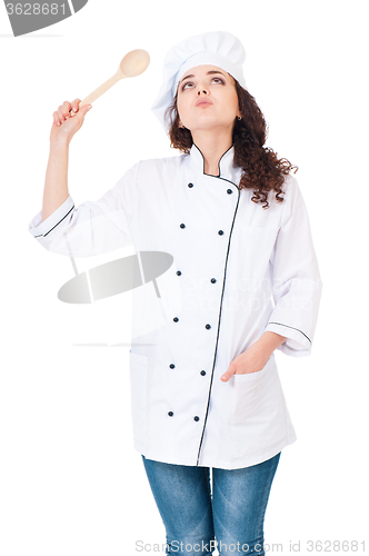 Image of Woman chef with wooden spoon