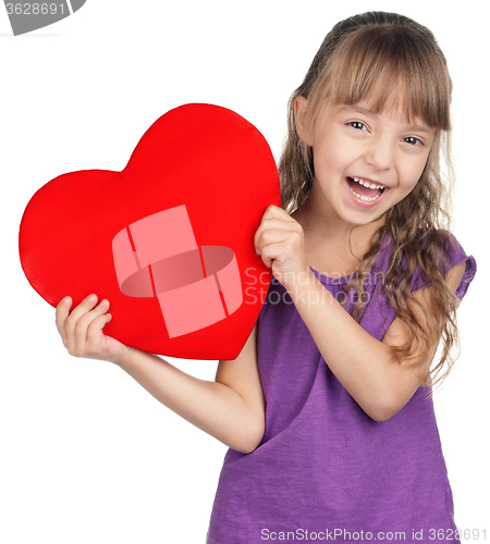 Image of Little girl with red heart