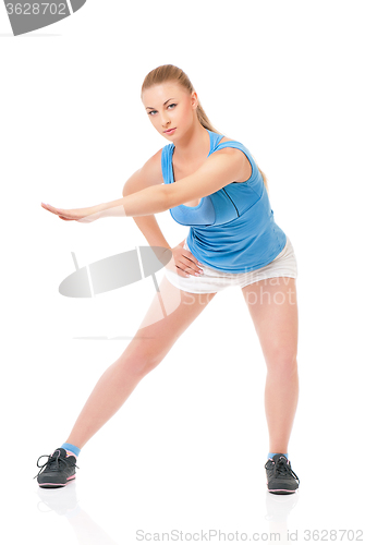 Image of Sportswoman doing stretching exorcises