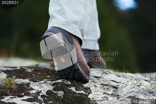 Image of hiking man with trekking boots