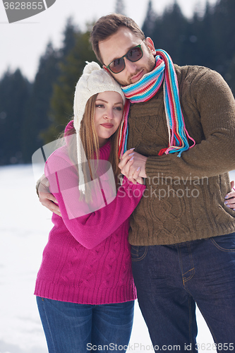 Image of romantic young couple on winter vacation