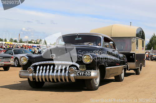 Image of Buick Super Eight Car and Vintage Travel Trailer