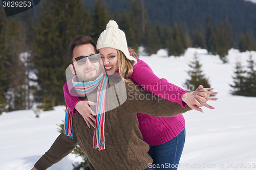 Image of romantic young couple on winter vacation