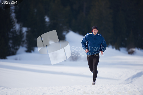 Image of jogging on snow in forest