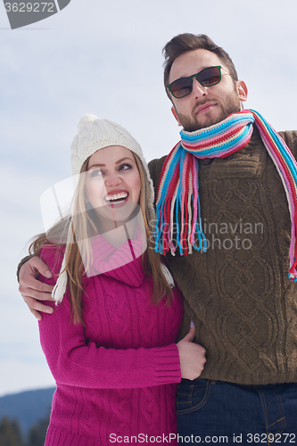 Image of romantic young couple on winter vacation