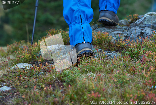 Image of hiking man with trekking boots