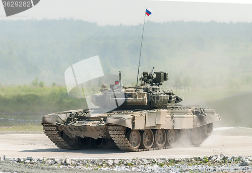 Image of Tank T-80s in motion