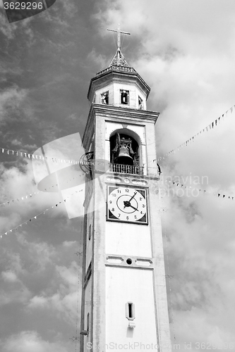 Image of ancien clock tower in italy europe old  stone and bell