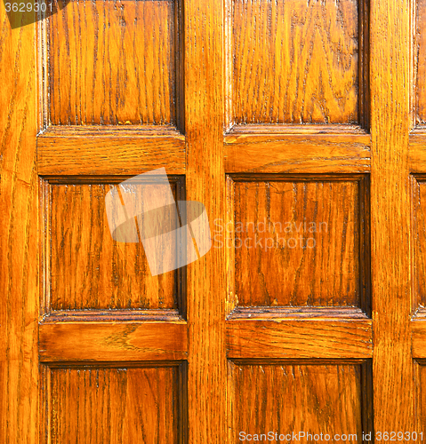 Image of the taino rusty  door curch  closed wood italy  lombardy   