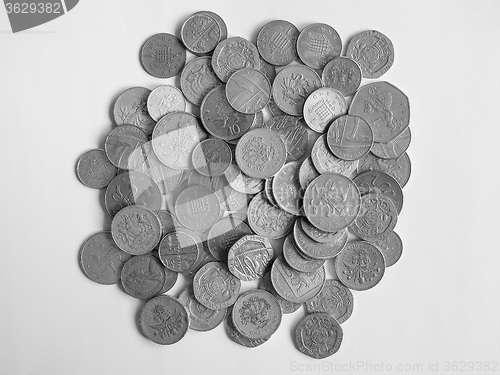 Image of Black and white Pound coins