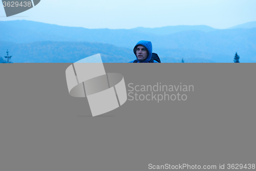 Image of advanture man with backpack hiking