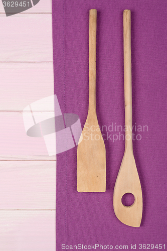 Image of Kitchenware on purple towel