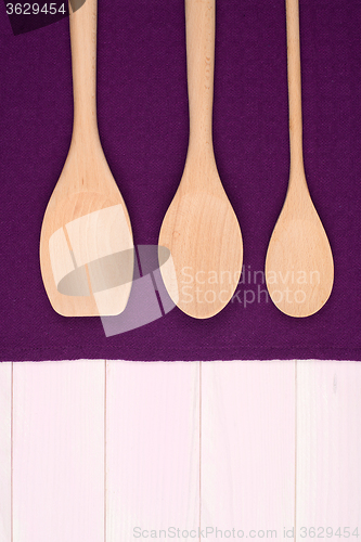 Image of Kitchenware on purple towel