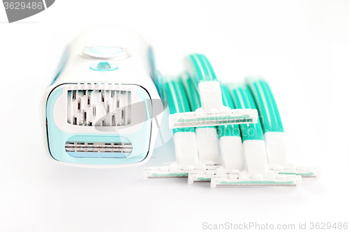Image of depilator and razor