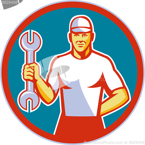 Image of Mechanic Holding Wrench Circle Retro