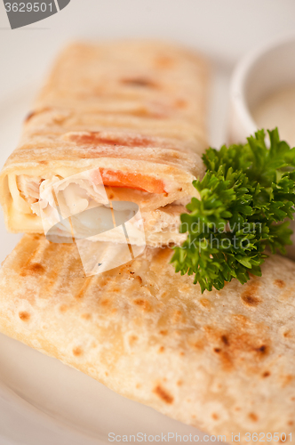 Image of tortilla with chicken breast