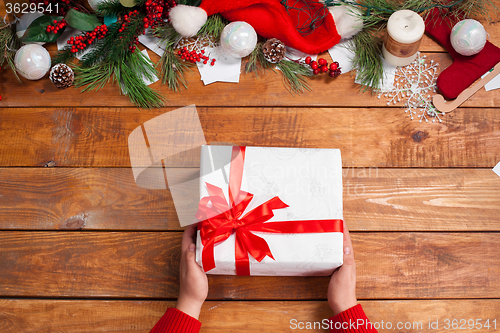 Image of The wooden table with Christmas decorations 