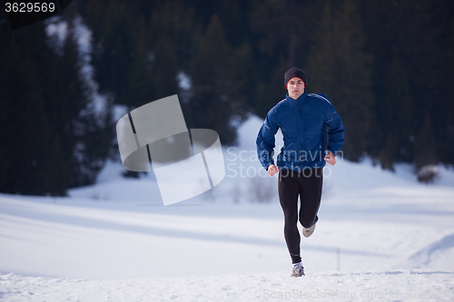 Image of jogging on snow in forest