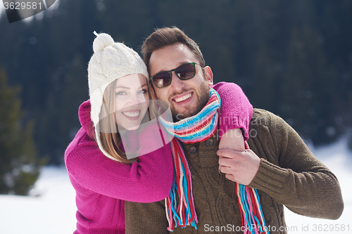 Image of romantic young couple on winter vacation