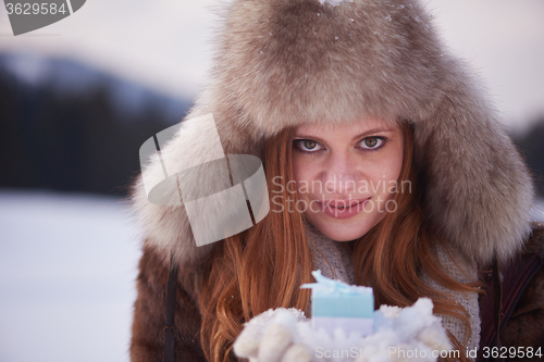 Image of winter girl with gift