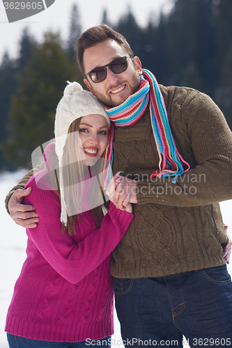 Image of romantic young couple on winter vacation