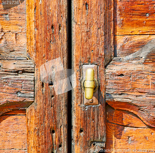 Image of europe old in  italy  antique close brown door and rusty lock  c