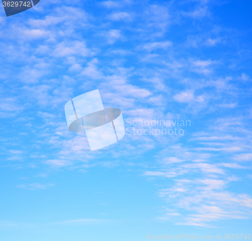 Image of in the blue sky white soft clouds and abstract background