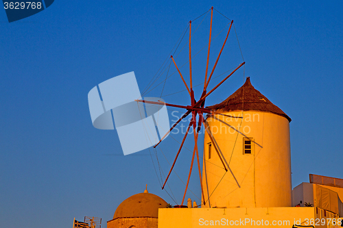 Image of old mill in santorini greece   sky sunrise