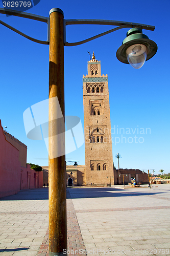 Image of history in street lamp  minaret religion and the blue     sky