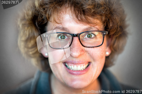 Image of Happy woman with glasses