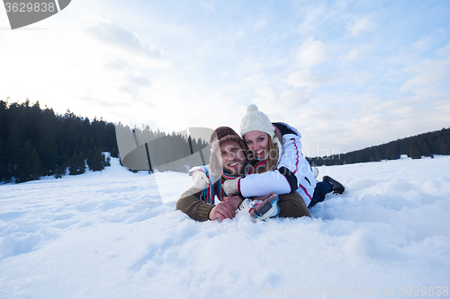 Image of romantic young couple on winter vacation