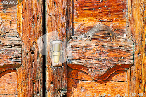 Image of europe old in  italy   close brown door  lock  closeup