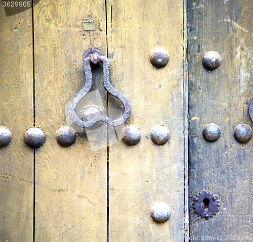 Image of brown  morocco in africa the old wood  facade home and rusty saf