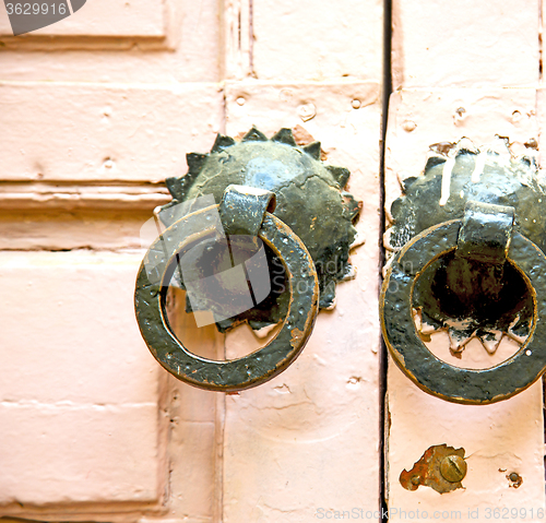 Image of brown  morocco in africa the old wood  facade home and rusty saf