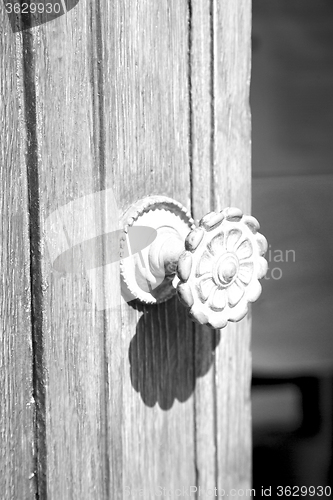 Image of stripped paint  door    in italy   ancian wood and traditional  