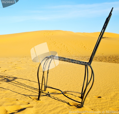 Image of table and seat in desert  sahara morocco    africa yellow sand