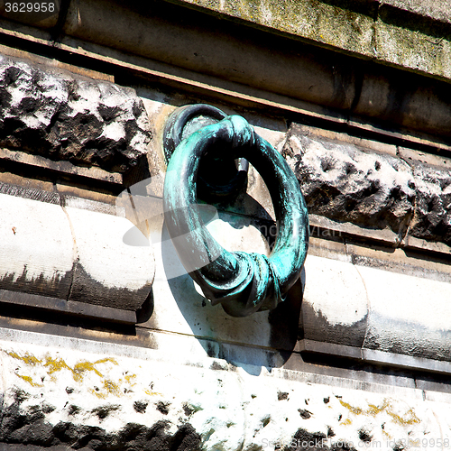 Image of blue   handle in london antique concrete  rusty  brass nail and 