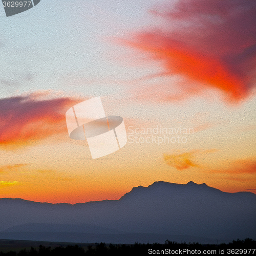 Image of mountain in morocco africa lans and red sunrise