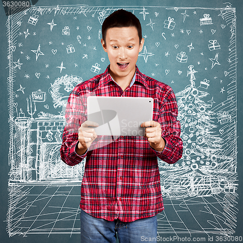 Image of Man Looking For Christmas Gifts