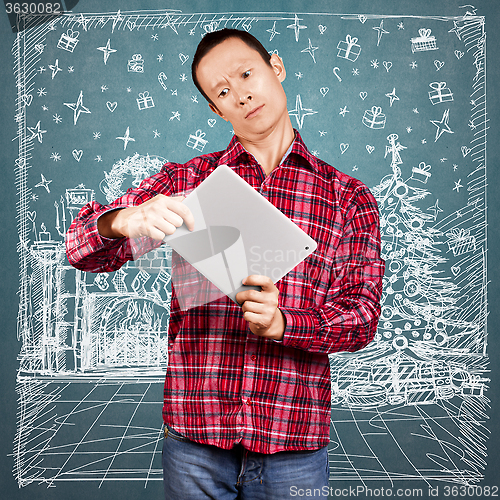 Image of Man Looking For Christmas Gifts