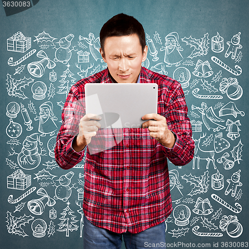 Image of Man Looking For Christmas Gifts
