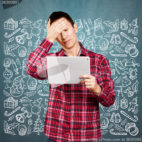 Image of Man Looking For Christmas Gifts