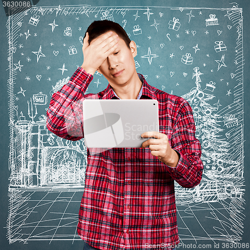 Image of Man Looking For Christmas Gifts