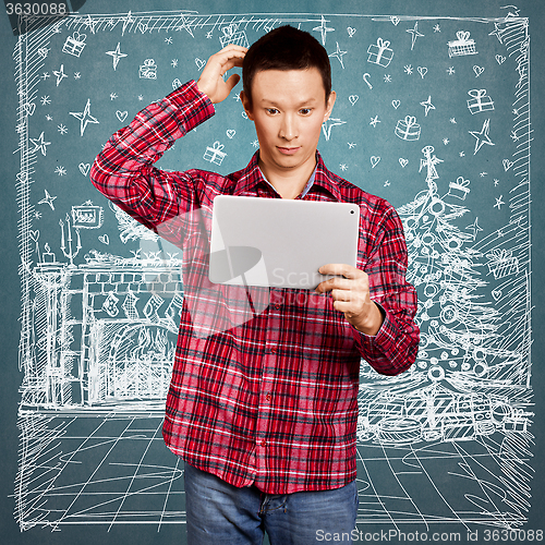 Image of Man Looking For Christmas Gifts