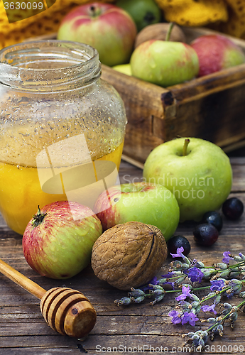 Image of Summer still life of apples and honey